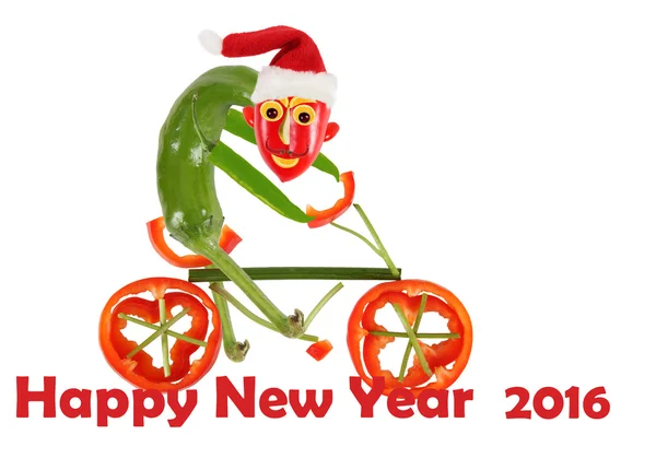 Pimenta engraçada numa bicicleta. Feliz Ano Novo — Fotografia de Stock