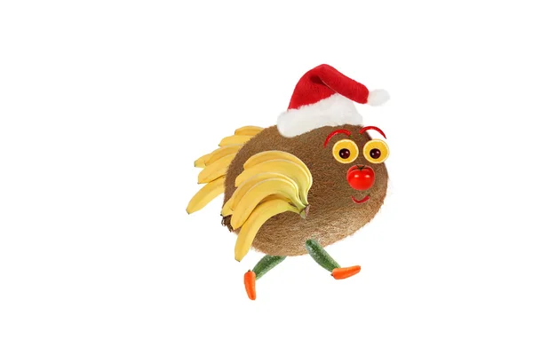 Concepto de comida creativa. Pequeño pájaro divertido hecho de kiwi y bana —  Fotos de Stock