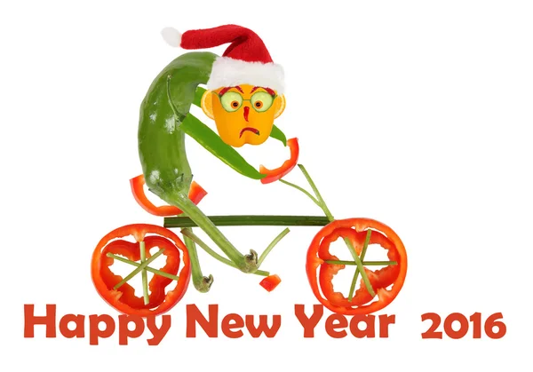 Komik biber bir bisiklet üzerinde. Yeni Yılınız Kutlu Olsun — Stok fotoğraf