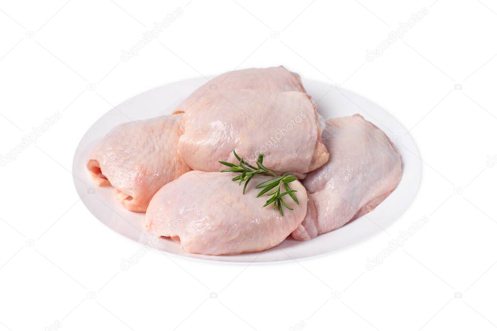 Raw chicken thighs on plate.Chicken Thigh White Plate Isolated Object White Background Raw Chicken Meat.