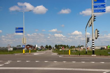 N219 regional road named Eerste Tochtweg at the area for new village in future in the Zuidplaspolder in Netherlands