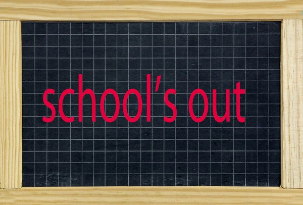 School is out written on a chalkboard — Stock Photo, Image