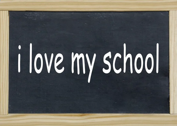 Bir kara tahta yazılı Okulumu seviyorum — Stok fotoğraf