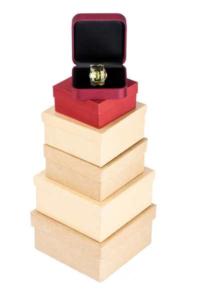 Ring on a cardboard box tower — Stock Photo, Image