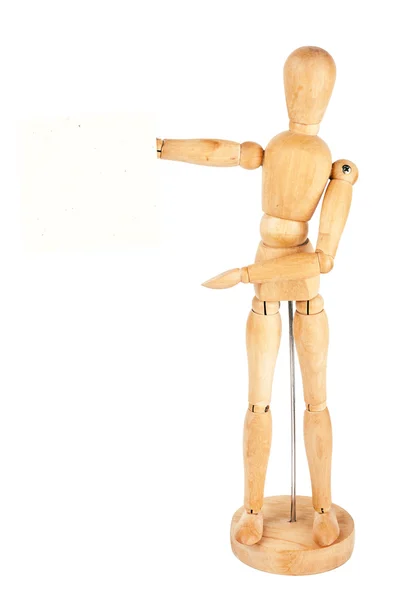 Wooden dummy holding paper — Stock Photo, Image