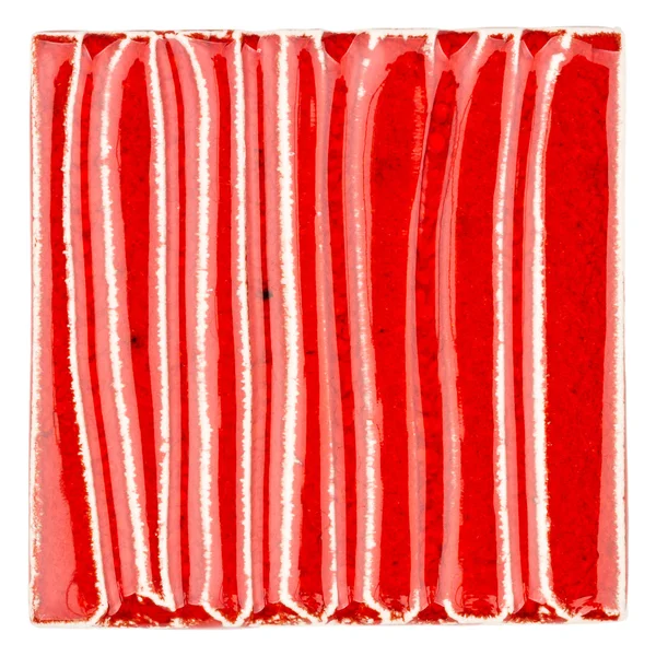 Handmade glazed red ceramic tile — Stock Photo, Image