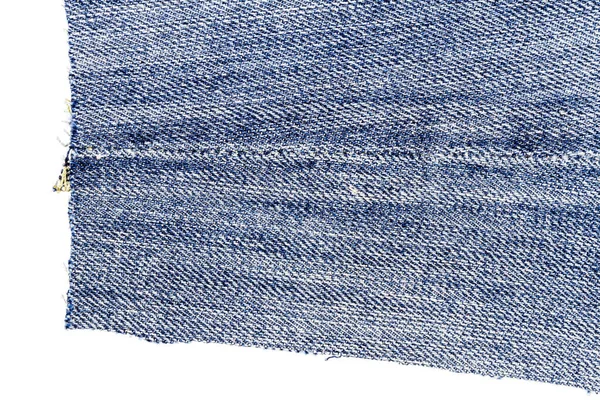 Pedaço Tecido Jeans Azul Claro Isolado Fundo Branco Bordas Irregulares — Fotografia de Stock