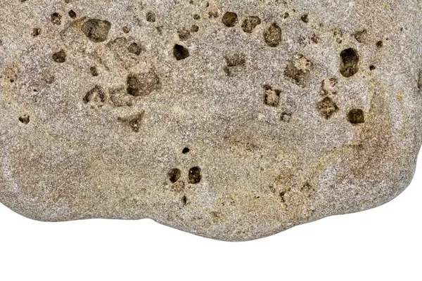 白地に孤立したベージュ色の石の一部 — ストック写真