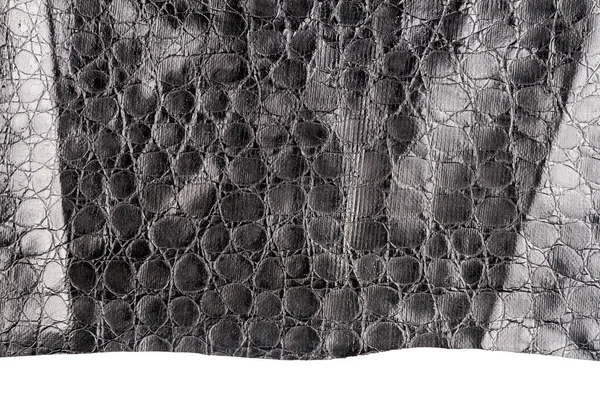 白色背景上孤立的一块黑色人造皮革 假鳄鱼皮 — 图库照片