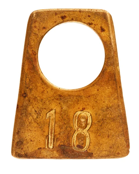 Antik mässing garderob etikett med nummer 18 — Stockfoto