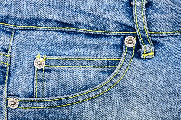 Tecido de jeans azul com bolso — Fotografia de Stock