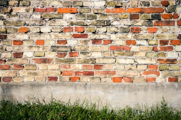 Red and yellow brick wall background — Stock Photo, Image