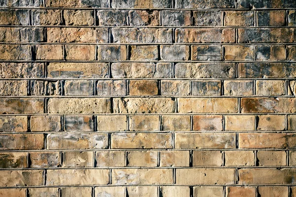 Muro di mattoni gialli — Foto Stock