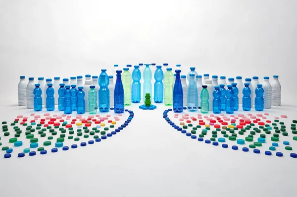 Plastic bottles, plastic caps. Plastic city concept. Plastic free concept.