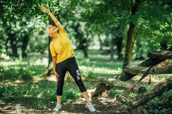 Senior Woman Stretching Outdoor Walking Exercise — Stock Photo, Image