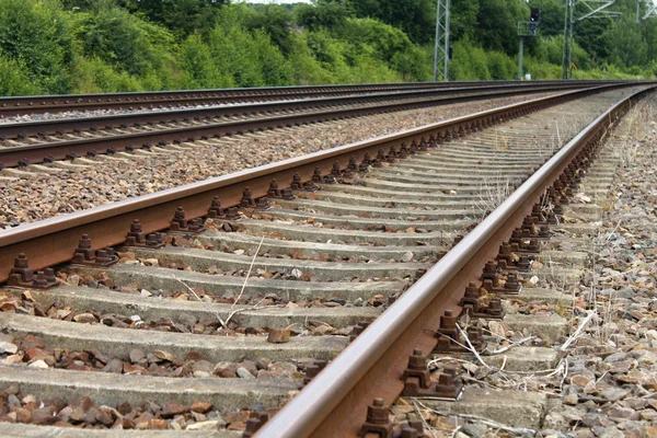 Iron rusty train railway detail dark stones — Stock Photo, Image