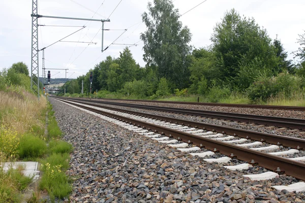 さびた鉄鉄道鉄道詳細暗い石 — ストック写真