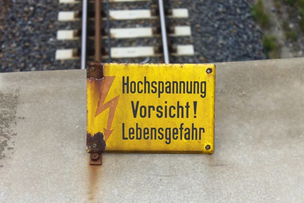 Iron rusty train railway detail dark stones — Stock Photo, Image