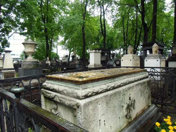 grave graveyard death park prominent stone figure art past fading died