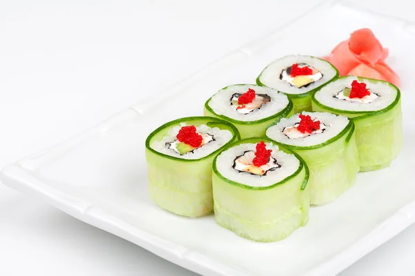 Sushi roll with avocado, cucumber and caviar. — Stock Photo, Image