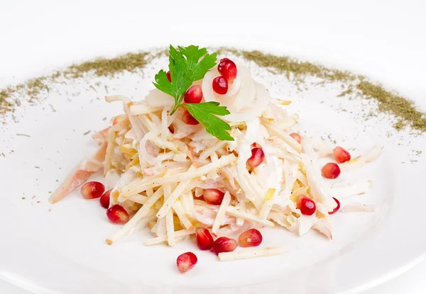 Salad with squid, onion, apple and pomegranate — Stock Photo, Image