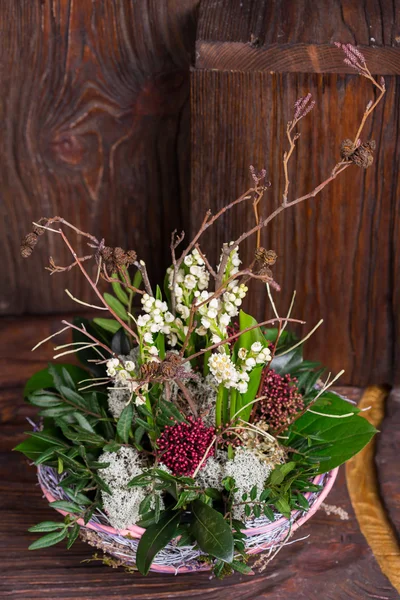 Lily on the valley in handmade basket  decor composition — Stock Photo, Image