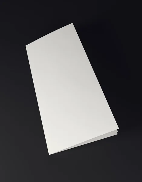 Makieta do białego papieru składany na czarnym tle — Zdjęcie stockowe