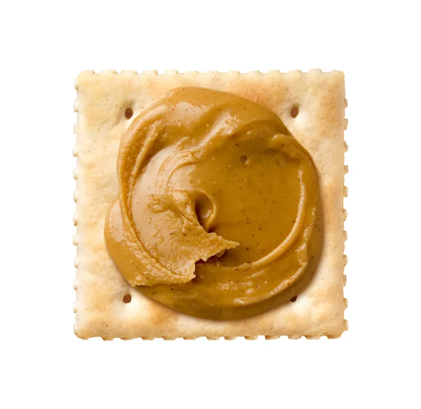 Pindakaas op een Cracker Saltine — Stockfoto