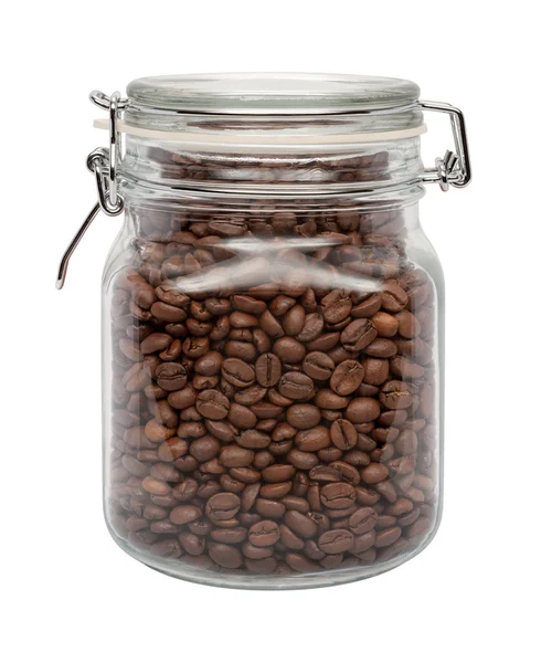 Kaffeebohnen im Glaskanister lizenzfreie Stockfotos