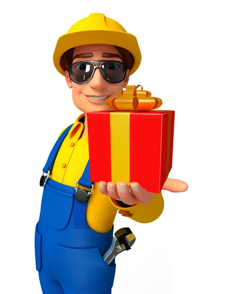 Young Mechanic with gift box — Stock Photo, Image