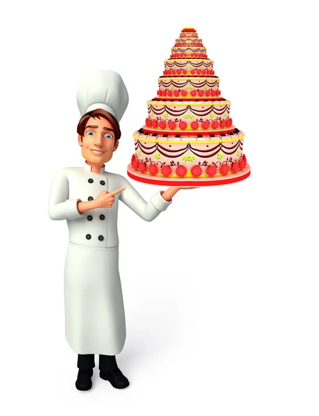Молодий шеф-кухар з тортами — стокове фото