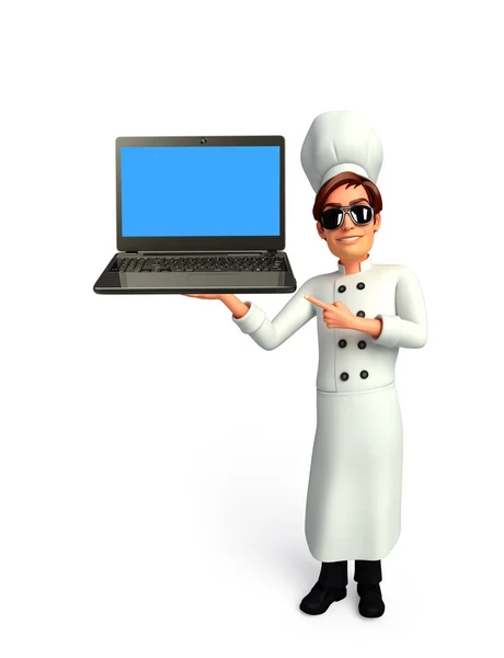 Jonge chef-kok met laptop — Stockfoto