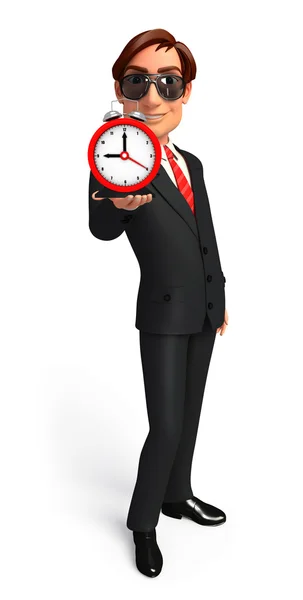 Joven hombre de negocios con reloj de mesa — Foto de Stock