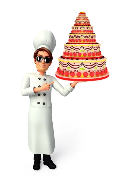 Young chef with cake — Stock Photo, Image