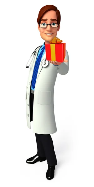 Doctor joven con caja de regalo — Foto de Stock