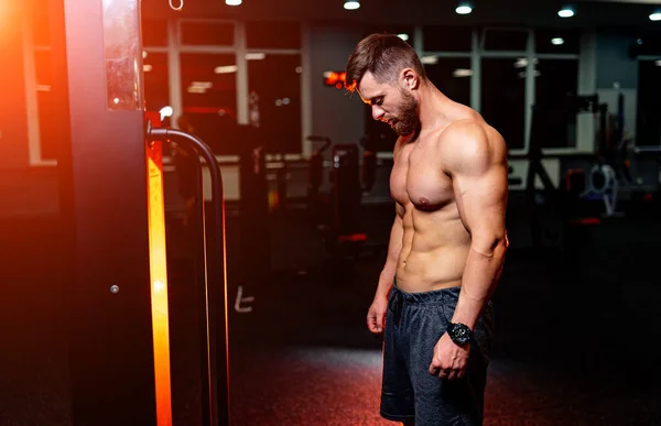 Strong Attractive Bodybuilder Lifestyle Gym Background Halfnacked Man Stands Half — Stock Photo, Image