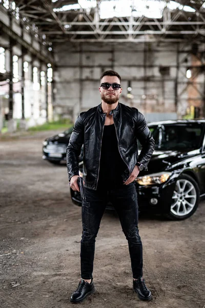 Handsome Young Man Leather Jacket Holding Gun Cool Sunglasses Brutal — Stock Photo, Image