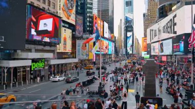 New York, USA, 1 August 2025: Times Square in New York filled with people. Multiple billboards and screens on the buildings of Midtown Manhattan.