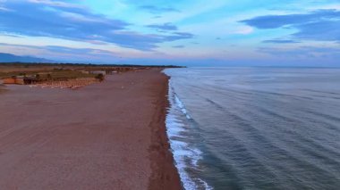 Ulcinj, Montenegro, 14 August 2025: Long Coastline Wave Pattern. Long sandy coast with gentle Adriatic waves forming repeating patterns.