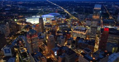 Detroit, USA, 28 July 2025: Spectacular luminous cityscape of Detroit, Michigan, USA at night. Drone footage approaching the well-lit Comerica Stadium in the downtown.