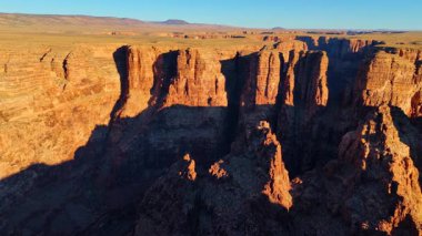 Deep canyon with pointed rocks inside. Incredible geological formations of Marble Canyon, Coconino County, Arizona, USA from drone.