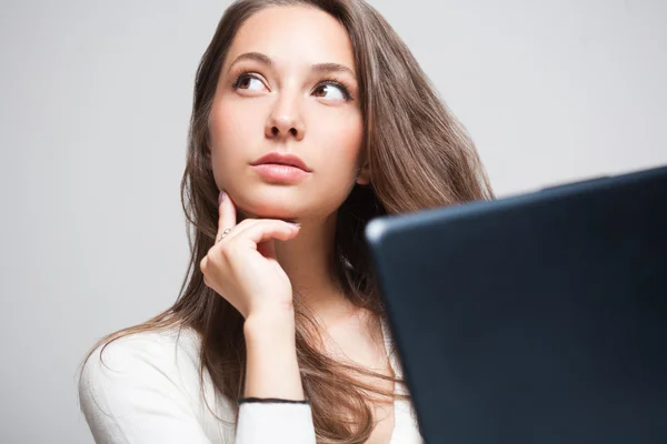 Brunette beauty using laptop. — Stock Photo, Image