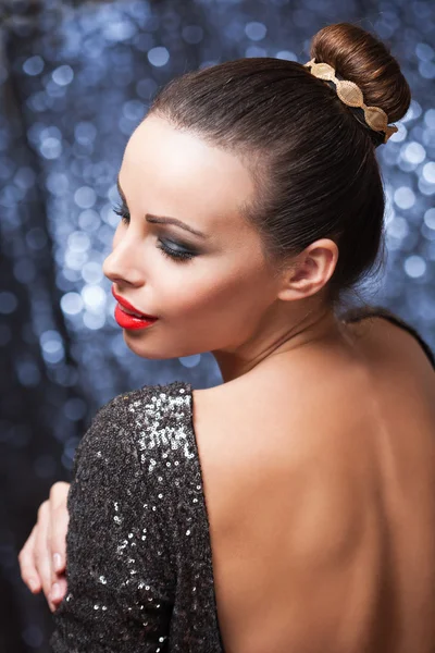 Elegant festive brunette. — Stock Photo, Image