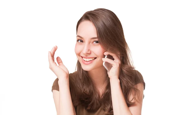 Sweet young brunette using mobile phone. — Stock Photo, Image