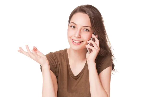 Zoete jonge brunette met behulp van mobiele telefoon. — Stockfoto