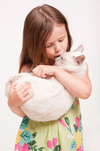 Emotional young girl with cat. — Stock Photo, Image