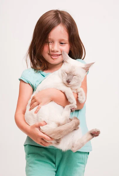 Emotional young girl with cat. — Stock Photo, Image