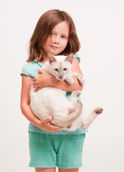 Emotional young girl with cat. — Stock Photo, Image