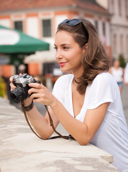 Brunette beauty taking photo. — Stock Photo, Image