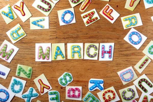 Colorful letters spelled as march — Stock Photo, Image